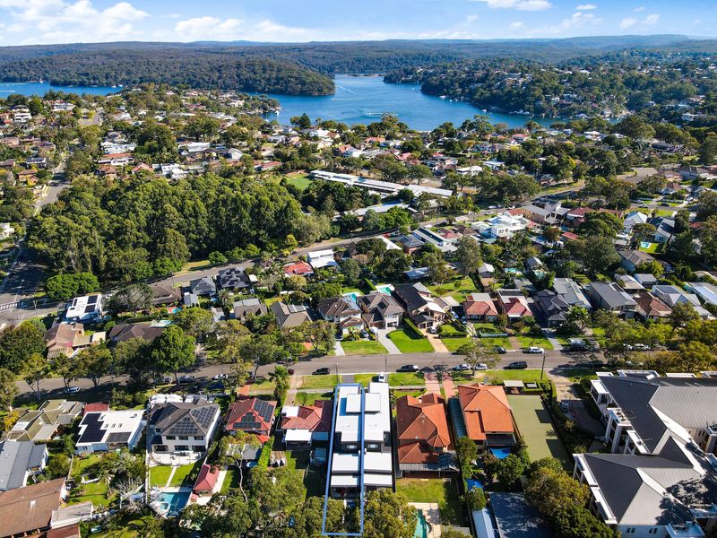 Aerial view of homes beside a river