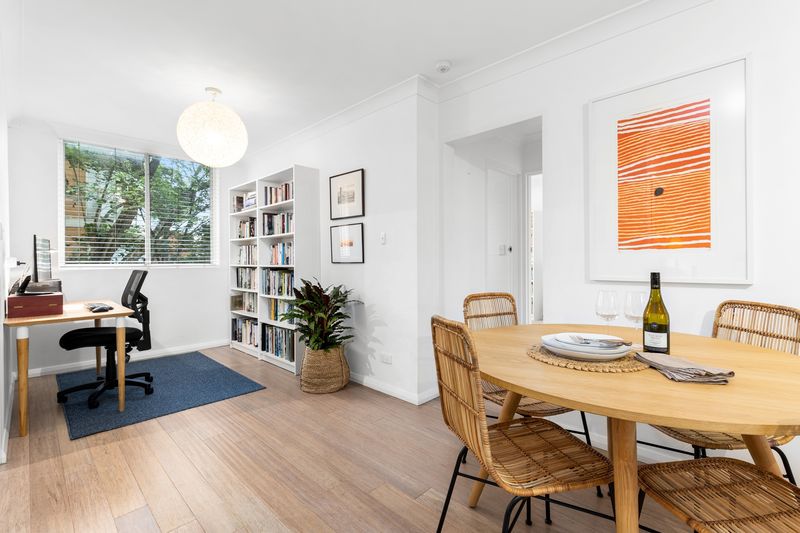 Study nook and round dining table by a window