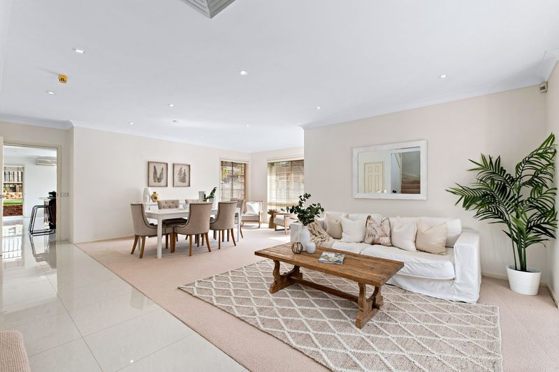 Living and dining room with a timber coffee table