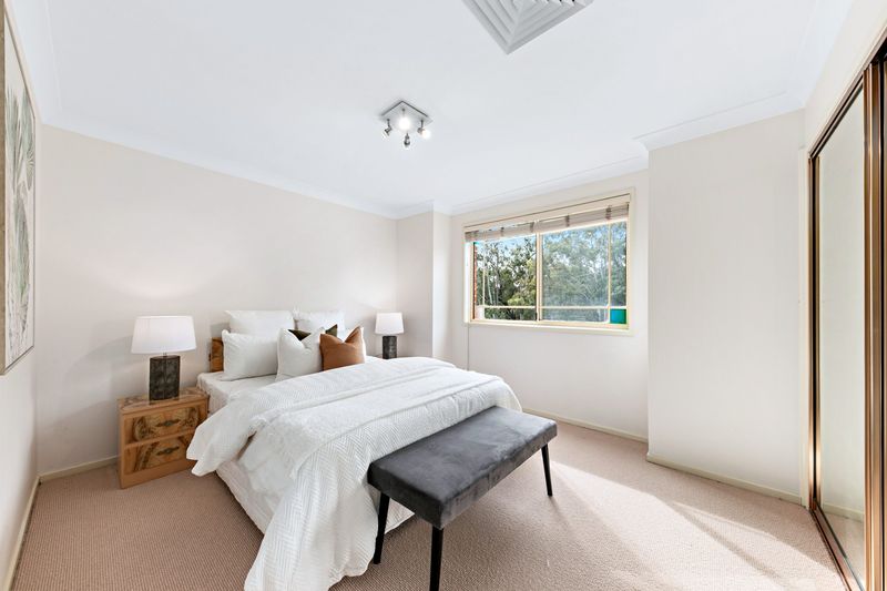 Main bedroom with white linen