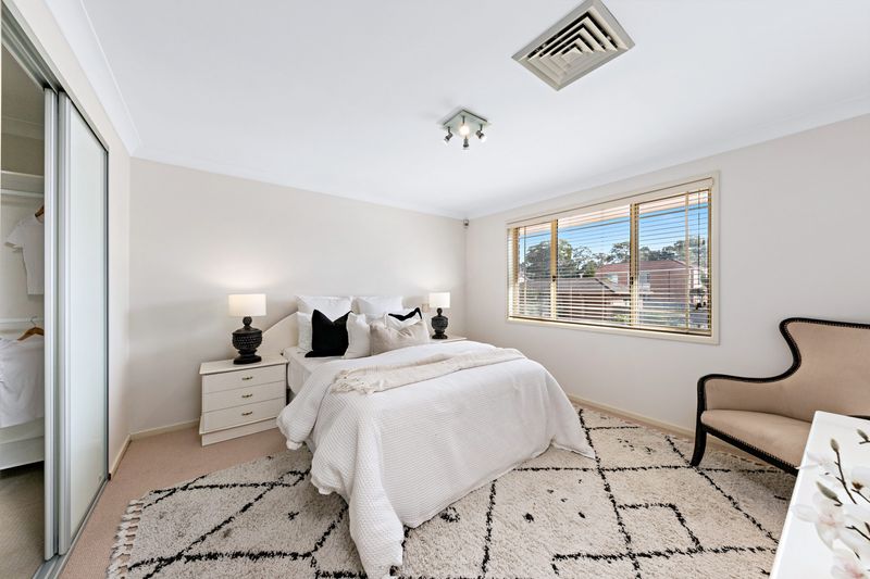Bedroom with a patterned rug