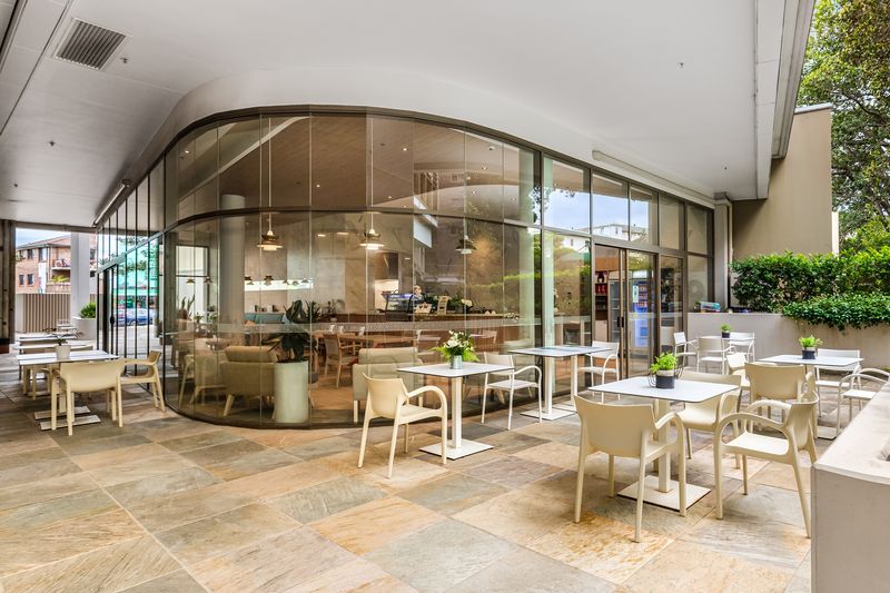 Cafe terrace with a curved glass front